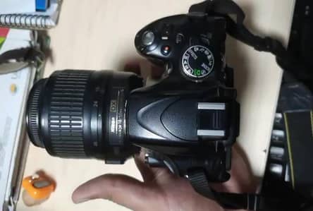 Nikon D5100 with two lenses and bag
