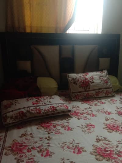 bed with side tables for