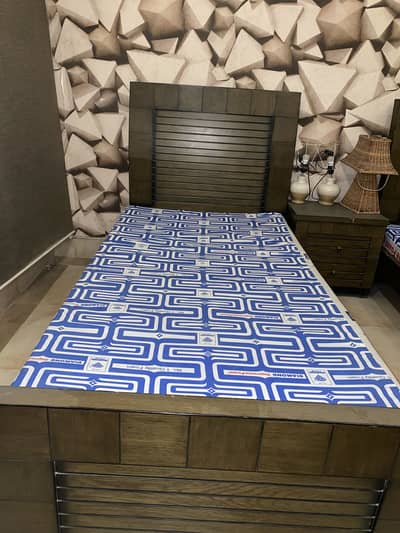 2 single bed set with brand new mattresses and centre table