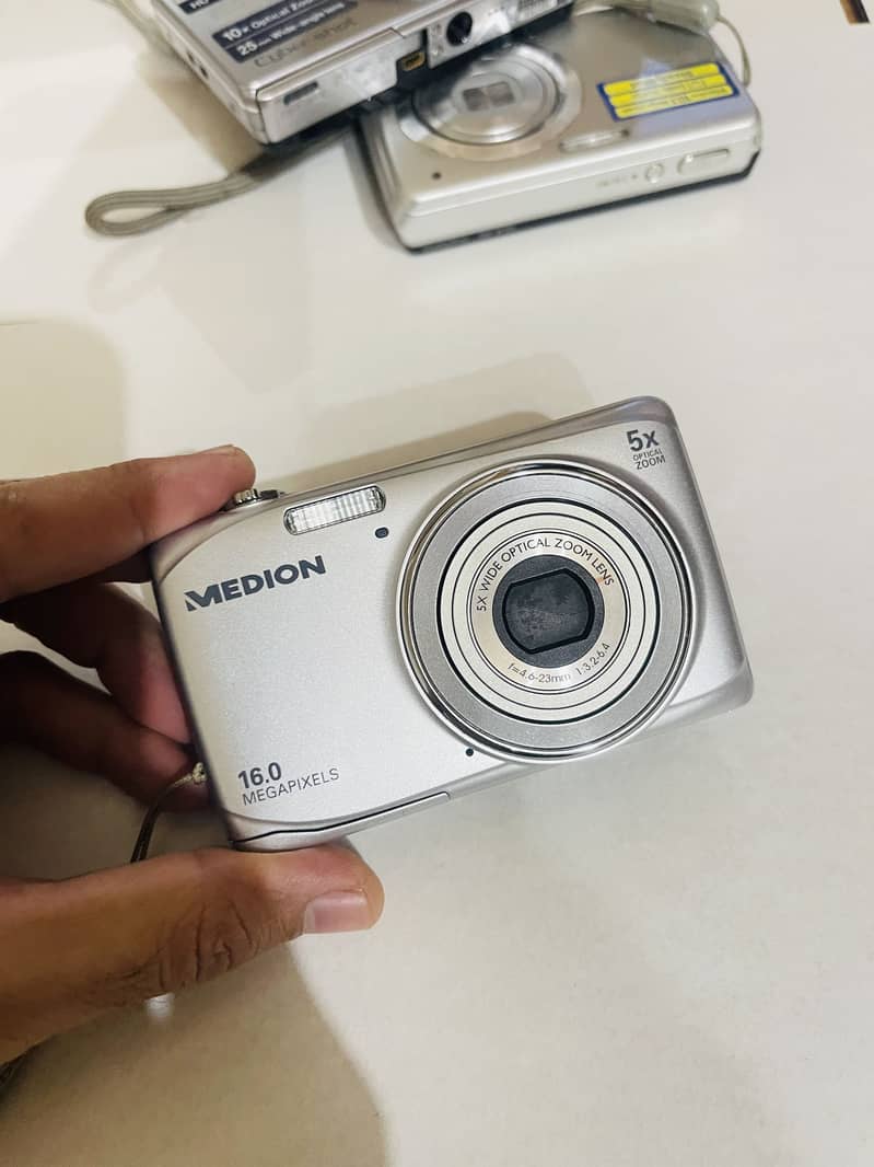 Digital cameras 12