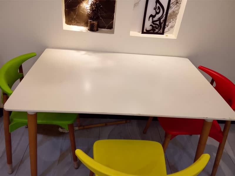 used dinning table with 4 multi chairs 2