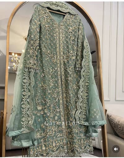 Heavy handmade embroidered dress for party wear| medium size