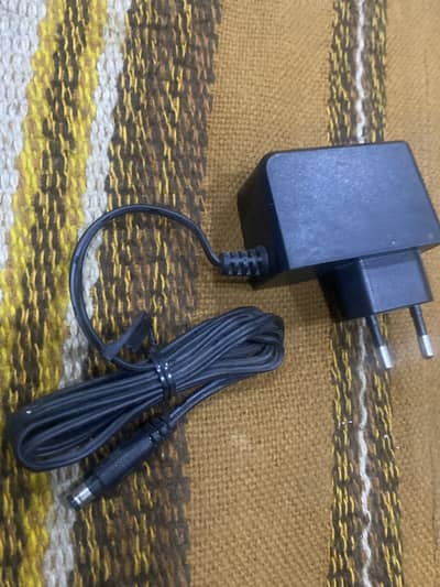 12v1.5A adapter originally
