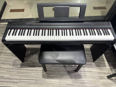 Yamaha p115 with original supply  piano stand  lyrics stand and bench