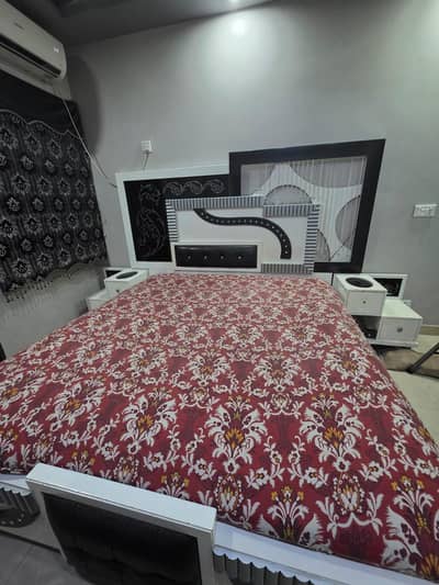 king size bed with 2 bed sides