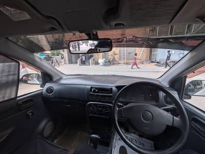 Daihatsu Mira 2004