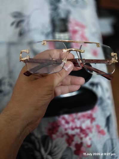 Branded Sunglasses change color to brown in sunlight