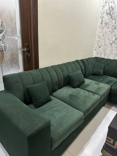 Emerald green velvet L shaped sofa