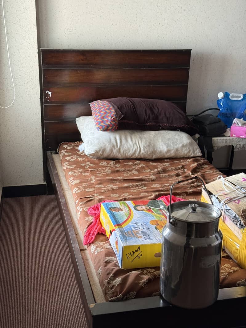 Wooden single bed 0