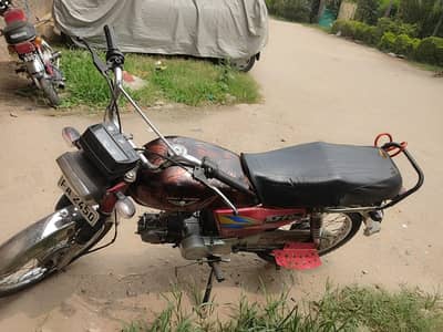 2013 Model Dhoom 70 , Engine Bhut Garam Hota hy, Documents Complete