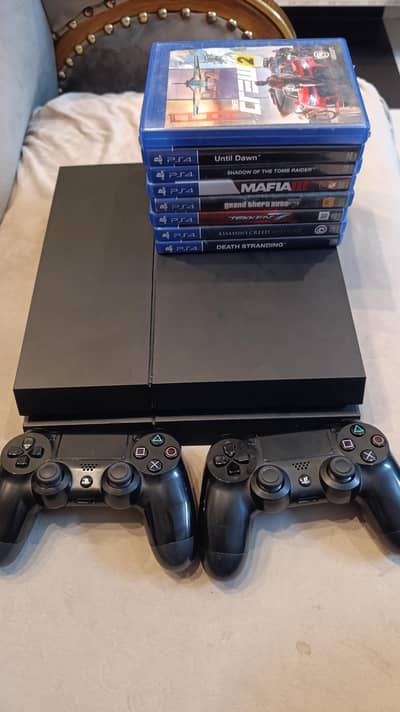 PS4 2015 VERSION (1TB) WITH ORIGNAL CONTROLLERS AND ACCESSORIES