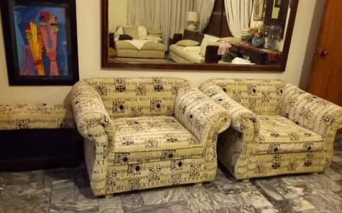 2 seats of sofa and one small table for bed room
