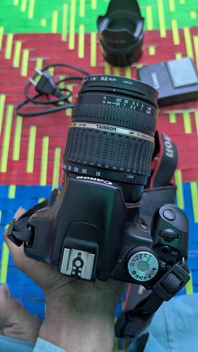 I want sale my DSLR conon 500d with 2 lans