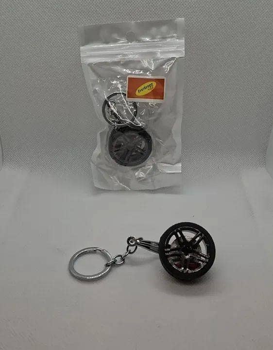 ROTATING TYRE FIXED RIM WITH BRAKE SHOE METAL KEYCHAIN STAINLESS STEEL RIM SPINNING TYRE PACK OF ONE