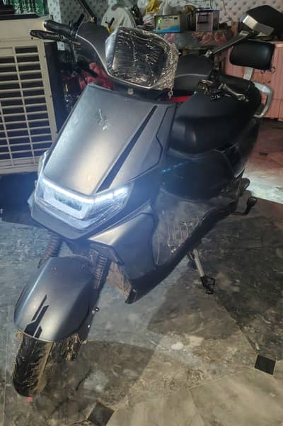 electric scooter range 80km 1 week phly li hai bilkul new hai abi