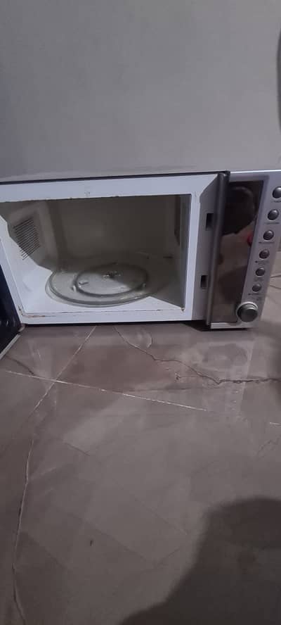 Dawlance microwave plus oven working well good condition f