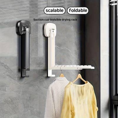 Foldable wall clothes hanger