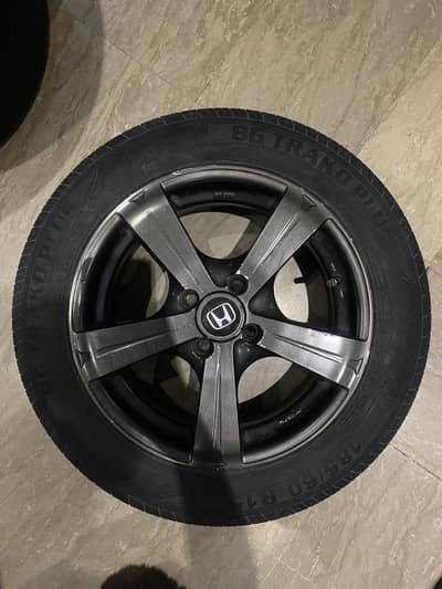 Set of 4  Alloy Rims with BG Trako Plus Tires (185/60 R15)