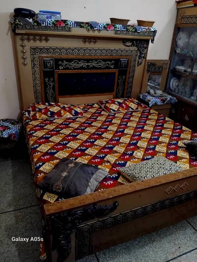 double bed with side tables or dressing or showcase