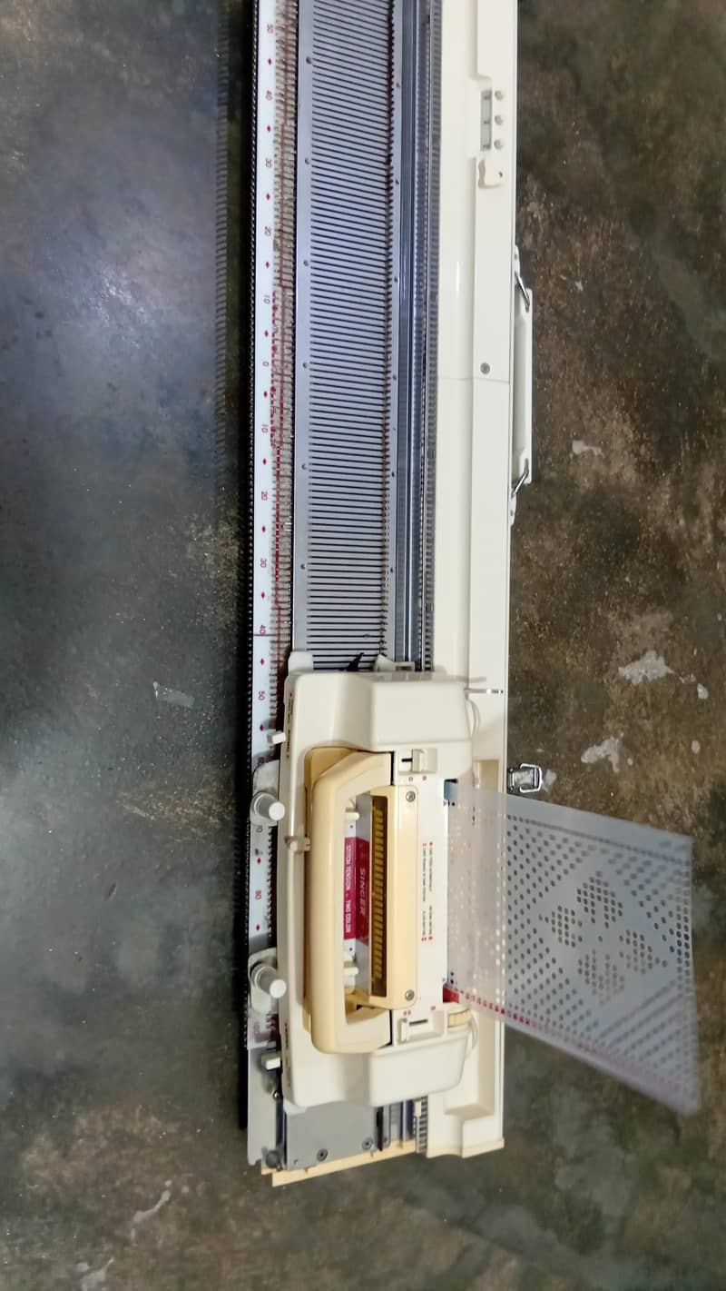 KNITTING.  MACHINE 4