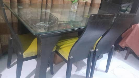 Six chairs wooden dining table with heavy top glass