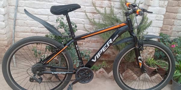 Full size imported sports cycle for sale in lush condition.