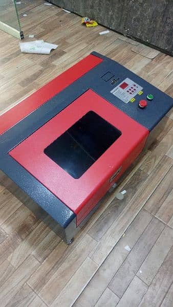 Laser cutting and engrawing machine