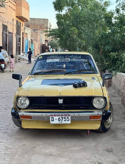 Toyota Corolla 1976 contact no 03002538099