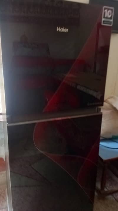 Haier refrigerator of model  HRF-316IP . Two doors condition 10 by 10