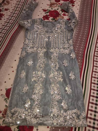 Heavy embroidery net shalwar kameez with duppta