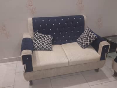 sofa set with curtains and tables