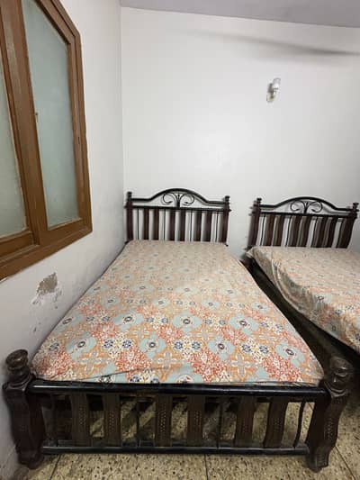 Single size 2 beds wooden and Iron