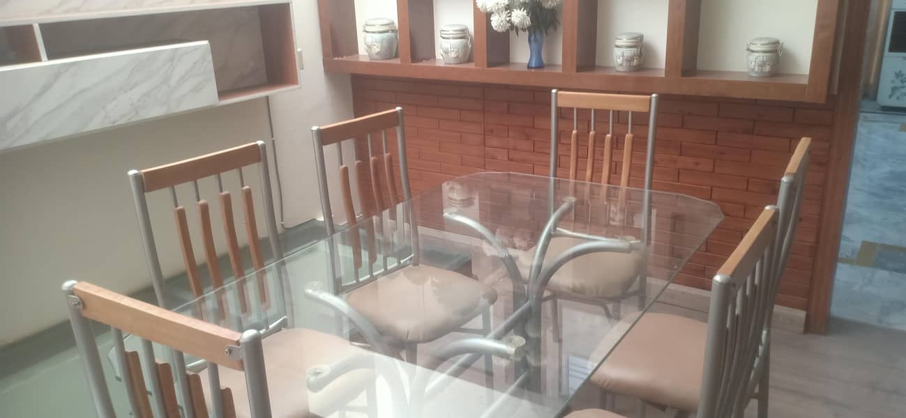 Two Single Beds Set and 6 chair Dining table 0