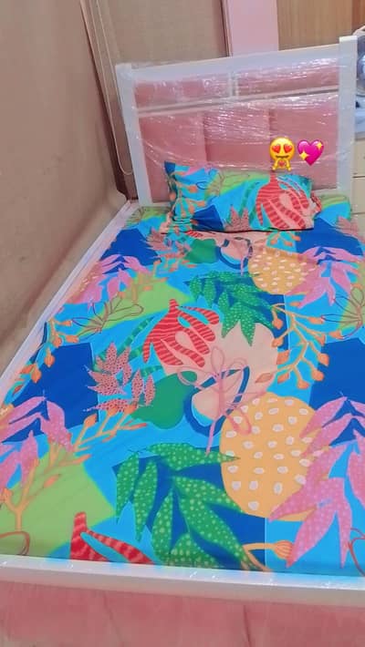 single wooden bed