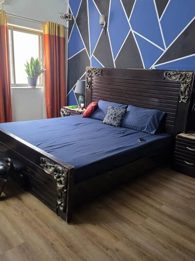 king size bed with two side tables