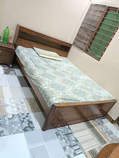 pure sheesham queen size bed, with two side tables without mattress