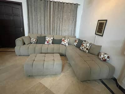 L shaped Sofa Set With a Puffy