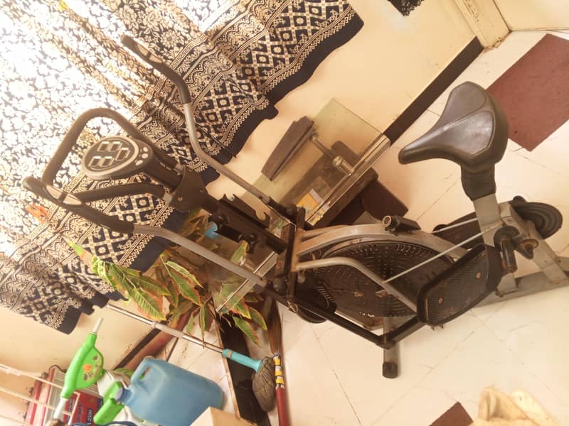 multi-function Exercise cycle with dumbbells Excellent condition 2