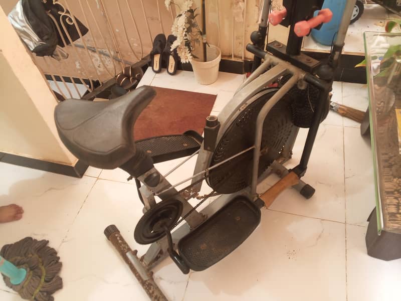 multi-function Exercise cycle with dumbbells Excellent condition 3