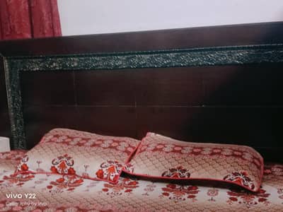 bed and same it's beautiful mirror