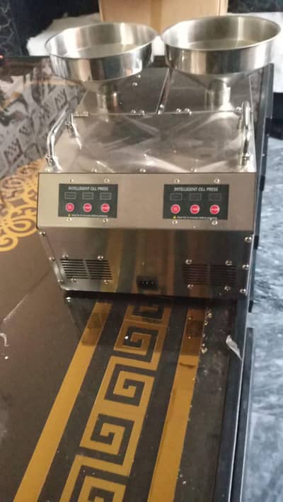 Double head cold oil press machine