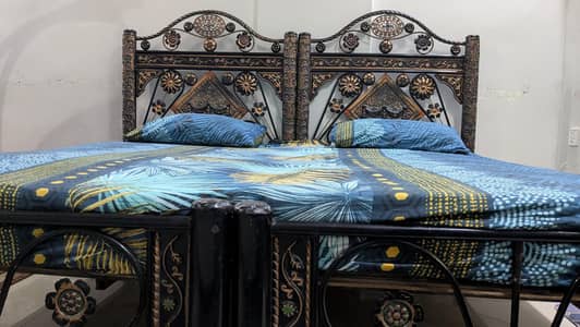 Pair of Single Iron Beds with Mattresses – Good Condition