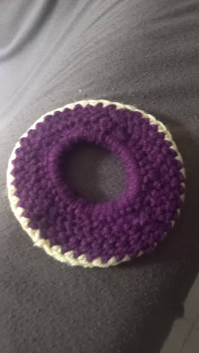 Purple and Yellow Crochet Scrunchie Wearable on Hands and Hair