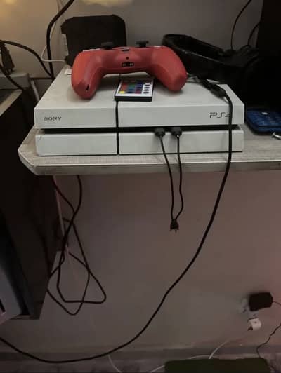 PS4 for sale 100% working with 3 controllers