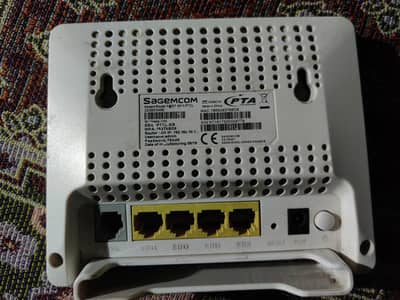 sagemcom fast 1410 ptcl router with charger