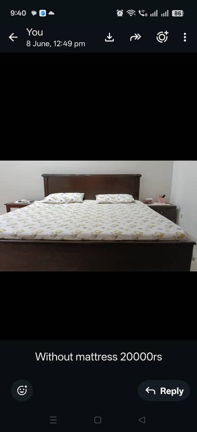 bed with one side table