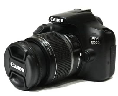 Canon 1300dwith 18-55lens and bag charger video +photo