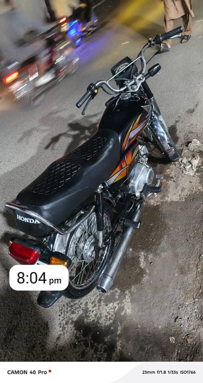 honda 70t black colour ha all ok ha 21 k last ma nikli h