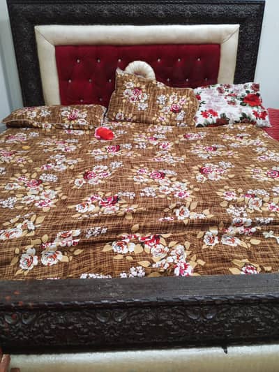 wooden bed with valvet headborad