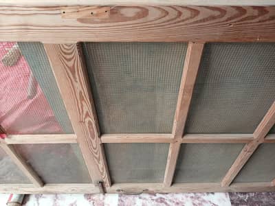 wodden door with double net